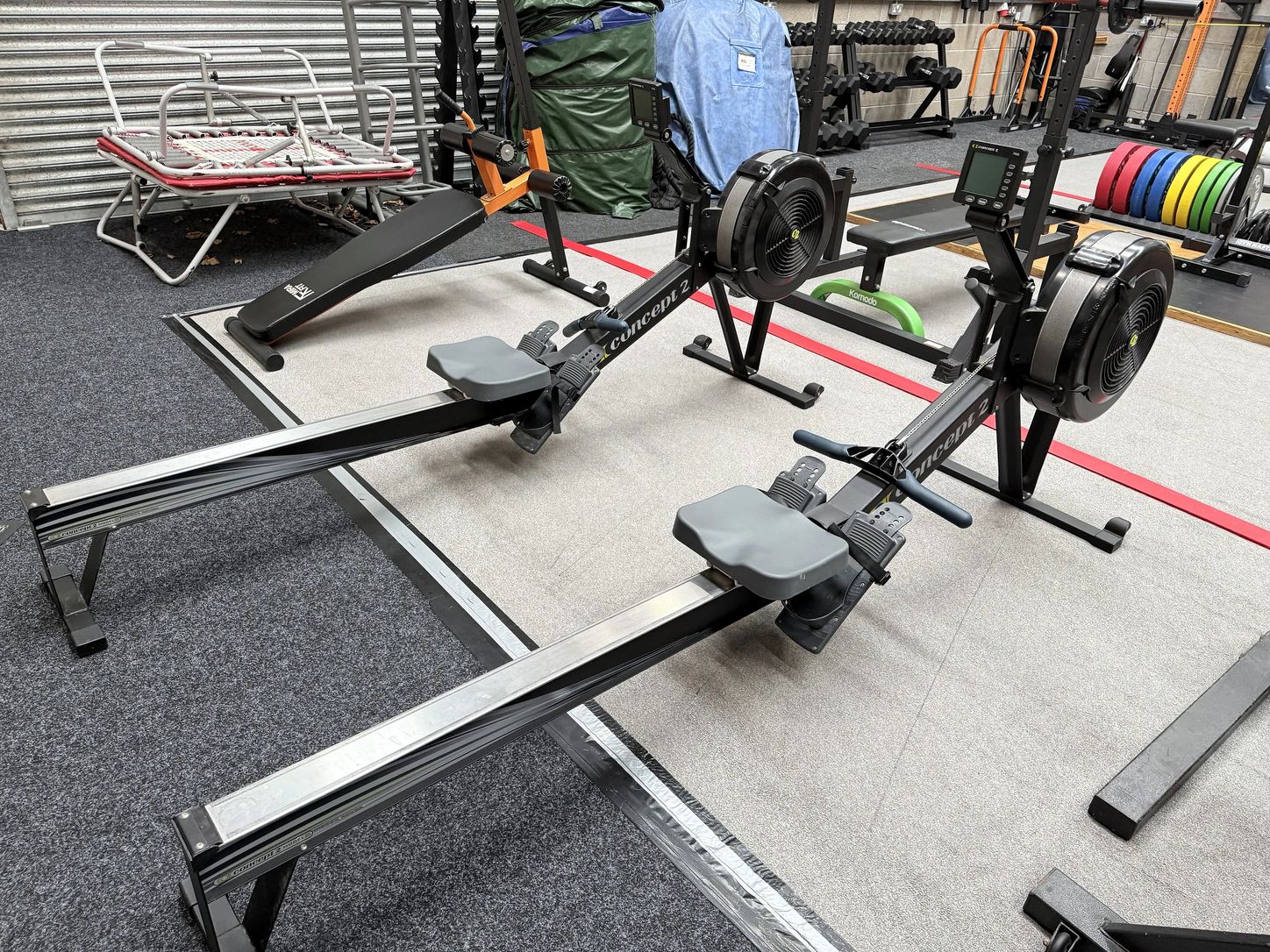 Conditioning machines and a rig with plates and accessories on the training floor